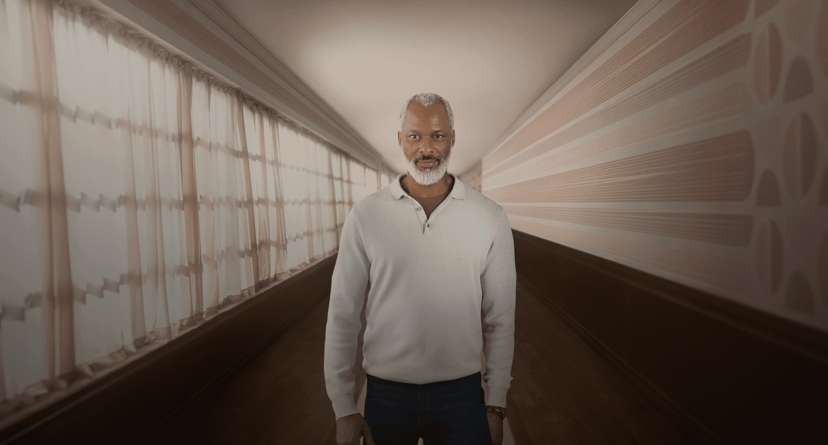 Man standing in a hallway