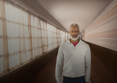 Patient portrayal of a man standing in a hallway